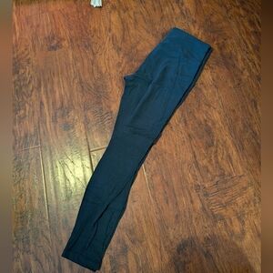 women's Medium Athleta Salutation Stash Leggings dark teal